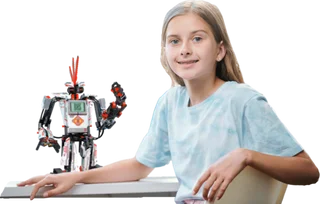 A girl with a robot on her table