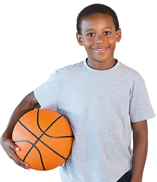 boy holding a basket ball